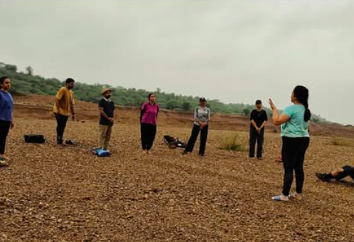 Shweta Thakkar, a holistic yoga facilitator and certified yoga instructor, conducting a yoga and mindfulness session focused on wellness and balanced living.