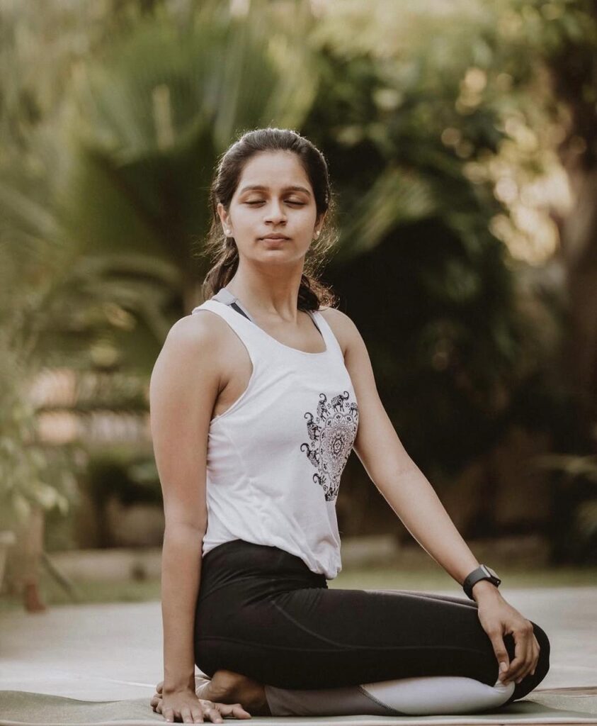 Yoga practitioner Ayushi Patel sharing her belief that yoga is a daily practice that promotes mindfulness, balance, and overall well-being.