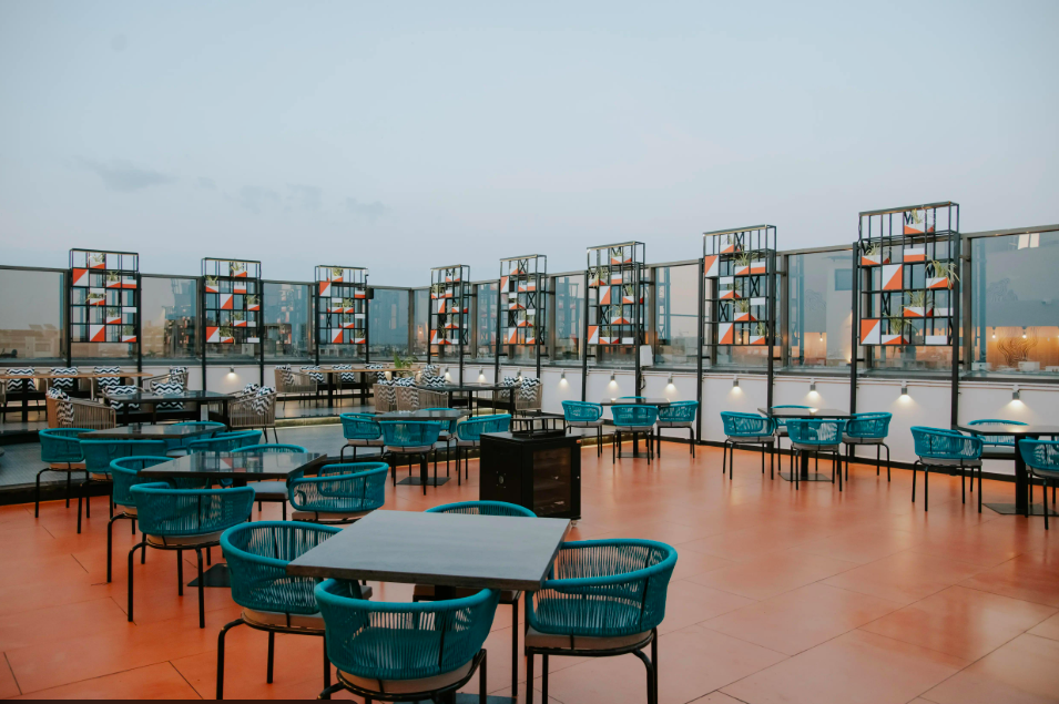 The Penthouse rooftop restaurant in Prahlad Nagar Ahmedabad with city skyline views and elegant outdoor seating