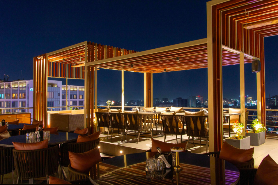 Upri Manzil rooftop cafe overlooking Vastrapur Lake in Ahmedabad, known for late-night dining and lake views