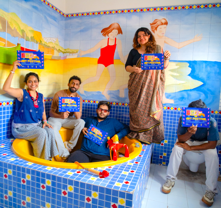 Visitors exploring artworks at Malak Amdavad Art Festival inside the heritage bungalow Manju Mahal in Nava Vadaj, Ahmedabad.