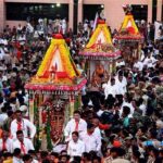 Lord Jagannath Rath Yatra procession in Ahmedabad featuring decorated chariots, devotees, and the famous Jamalpur route during Rath Yatra 2026.