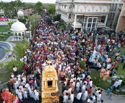 Local devotees participating in the traditional bhadaj Rath Yatra procession through the neighborhood streets of Ahmedabad